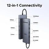 UGREEN USB-C Hub with 4K Video Ethernet and 10Gbps Data surrounded by various cables and connectors.