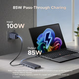UGREEN USB-C Hub with 4K Video Ethernet and 10Gbps Data surrounded by various cables and connectors.