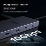 UGREEN USB-C Hub with 4K Video Ethernet and 10Gbps Data surrounded by various cables and connectors.